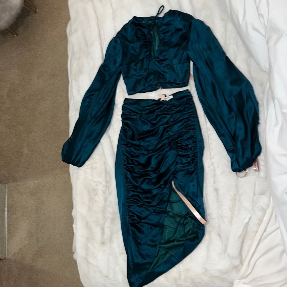 House of CB, never worn, tags on, top size is XS , and bottom is S